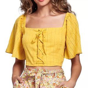 Lost & Wander NEW yellow flutter sleeve top with lace up front, size Large